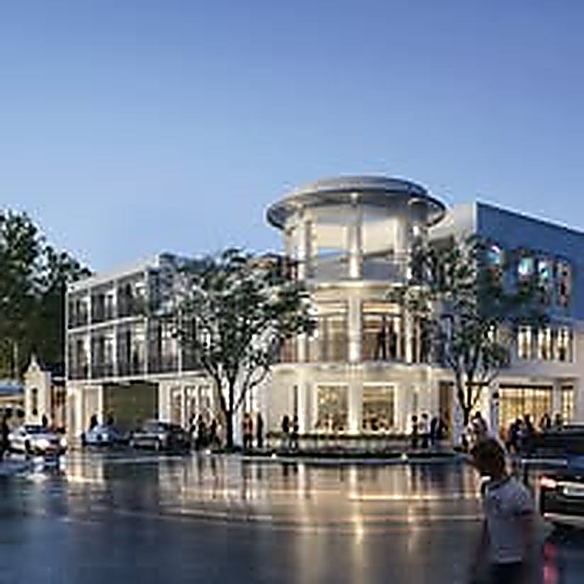 Coastal mixed-use rotunda at dusk